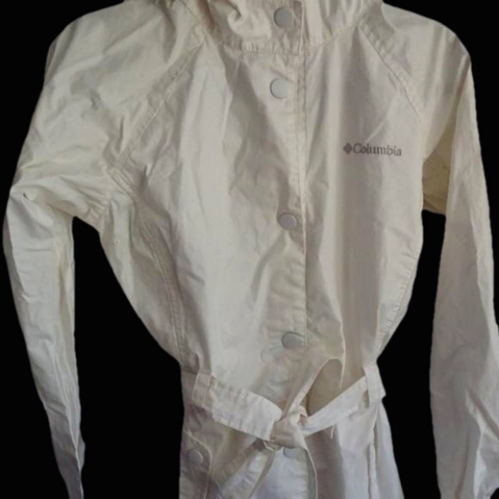 NEW COLUMBIA RAIN COAT DOES HAVE SOME ORANGE STAINING ONE OF THE ARMS